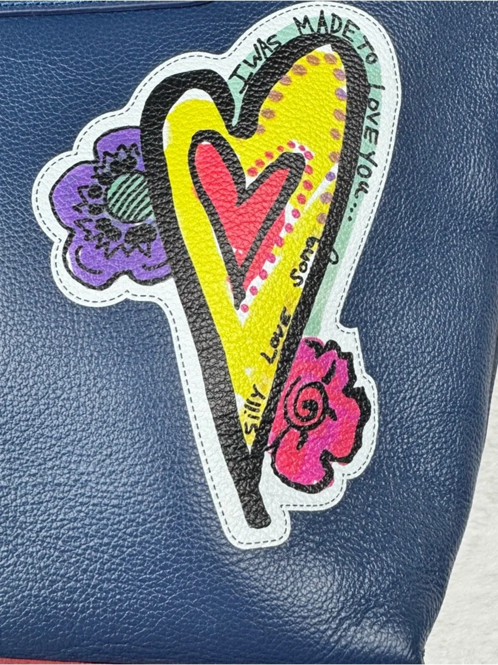 Brighton The Art of Love Tote, featuring a vibrant hand-drawn artwork.